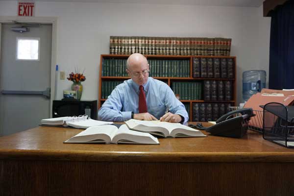 photo of Patrick McMenamin in his office